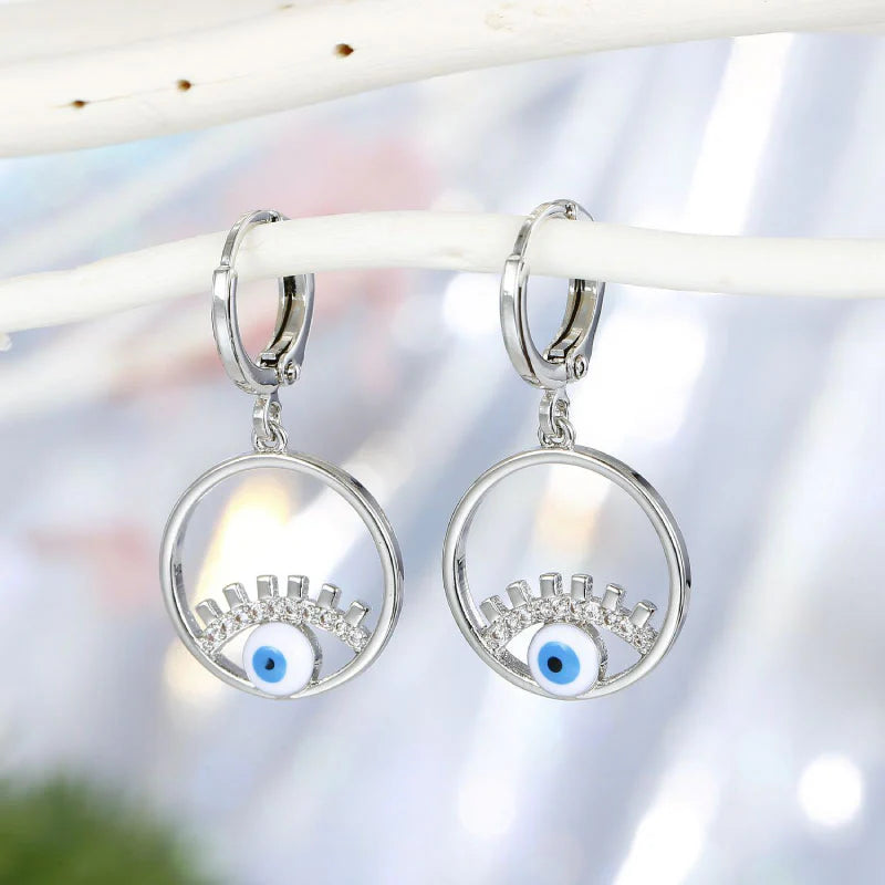 Silver Eye Huggie
